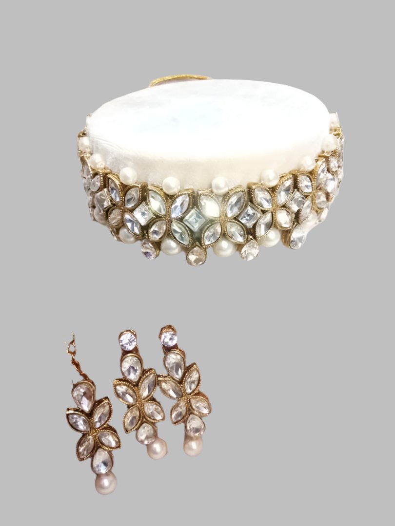Beautiful Alloy Choker set for women
Color:  White and gold
Material: Alloy
Country of Origin: INDIA
Enhance your style with our Beautiful Alloy Choker set for women. Made with high-quality alloy, it is perfect for adding a touch of elegance to any outfit. The sleek design and durability make it a must-have accessory for any fashion-forward woman. Embrace your beauty with this stunning choker set.
